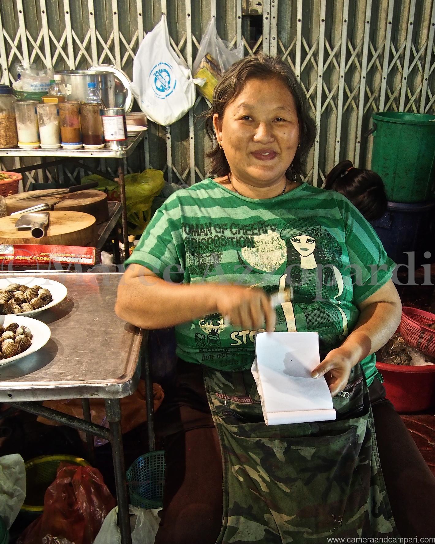 Smiling street food bosses in Chinatown Bangkok